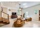 Spacious recreation room with casual seating, brick wall and staircase at 1175 18Th Ne Ave, Hickory, NC 28601
