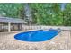 Backyard shot of pool surrounded by brick pavers and a white fence at 1175 18Th Ne Ave, Hickory, NC 28601