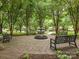 Charming common area features mature shade trees surrounding a central water feature and seating at 13604 Morehouse St, Huntersville, NC 28078