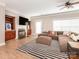Spacious living area with comfortable seating and a fireplace feature, perfect for relaxation at 13604 Morehouse St, Huntersville, NC 28078