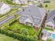 Aerial view of a home highlighting the landscaped backyard, patio, and proximity to neighborhood amenities at 13708 Huntson Park Ln, Huntersville, NC 28078