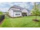 Spacious backyard features a well-maintained lawn and a patio area at 13708 Huntson Park Ln, Huntersville, NC 28078