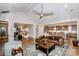 Spacious living room connected to the kitchen, with hardwood floors and modern furnishings at 13708 Huntson Park Ln, Huntersville, NC 28078