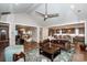 Open-concept living area flows to the kitchen with ample seating, and lots of natural light at 13708 Huntson Park Ln, Huntersville, NC 28078