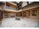 Expansive outdoor patio with stone floors and outdoor seating area at 1501 Alydar Ct, Waxhaw, NC 28173