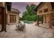 Beautiful in-ground pool and hot tub surrounded by lush landscaping at 1501 Alydar Ct, Waxhaw, NC 28173
