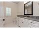 Bathroom featuring a white vanity with granite countertop and a shower/tub combo at 1501 Alydar Ct, Waxhaw, NC 28173