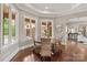 Charming breakfast nook with large windows, natural light, and views of the outdoor landscape at 1501 Alydar Ct, Waxhaw, NC 28173