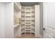 Walk-in closet featuring built-in shelving and space for storage at 1501 Alydar Ct, Waxhaw, NC 28173