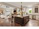 Spacious open kitchen with a large island, granite countertops, and stainless steel appliances at 1501 Alydar Ct, Waxhaw, NC 28173