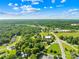 Aerial view showcasing the home's neighborhood, surrounded by lush greenery at 1528 Avondale Dr, Statesville, NC 28625