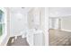 Contemporary bathroom showcasing a white tiled shower and bright vanity at 1528 Avondale Dr, Statesville, NC 28625