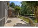 Wooden back deck featuring a wooden railing and a view of the well maintained backyard at 1629 Southpoint Ln, New London, NC 28127