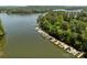 Aerial view of boat docks on a serene lake with lush green surroundings at 1629 Southpoint Ln, New London, NC 28127