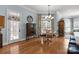 Bright dining area with natural light and modern chandelier at 1629 Southpoint Ln, New London, NC 28127