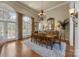 Formal dining room featuring natural light, chandelier, and hardwood floors at 1629 Southpoint Ln, New London, NC 28127