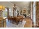 Spacious dining room flows into living room with fireplace at 1629 Southpoint Ln, New London, NC 28127