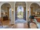 Grand foyer with hardwood floors and view to the front lawn at 1629 Southpoint Ln, New London, NC 28127