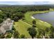 Aerial shot of golf course featuring lush green fairways and lakeside views at 1629 Southpoint Ln, New London, NC 28127