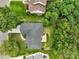 Aerial view of the home featuring a well-maintained yard, deck, and mature trees providing privacy at 1653 Shetland Ln, Rock Hill, SC 29730