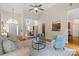 Spacious living room open to the dining area, kitchen view and with ample seating at 1653 Shetland Ln, Rock Hill, SC 29730