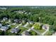 Neighborhood aerial view featuring homes with lush lawns and mature trees at 179 Browning Dr, Taylorsville, NC 28681