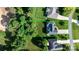 A high-angle view of a home, highlighting the landscaping and surrounding greenery, showcasing the property's boundaries at 179 Browning Dr, Taylorsville, NC 28681