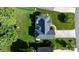 Aerial view of a home with a well-manicured yard and mature trees at 179 Browning Dr, Taylorsville, NC 28681