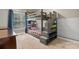 Fun bedroom featuring a unique bunk bed with built-in stairs and storage at 179 Browning Dr, Taylorsville, NC 28681