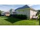 Exterior view of the home with brick facade, a spacious deck, and well-maintained landscaping at 179 Browning Dr, Taylorsville, NC 28681