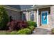 Close-up of front door with a vibrant blue color and inviting curb appeal at 179 Browning Dr, Taylorsville, NC 28681