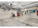 Clean two-car garage with storage for bikes and other equipment at 179 Browning Dr, Taylorsville, NC 28681