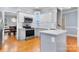 Charming kitchen featuring stainless appliances, lots of light, white countertops, and views into the dining room at 179 Browning Dr, Taylorsville, NC 28681