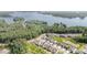 Beautiful aerial view of lakeside community with lush green trees and sparkling lake waters at 18019 Wilbanks Dr, Charlotte, NC 28278