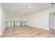 Bonus room with light wood flooring, a view of the outdoors, and ample natural light at 18019 Wilbanks Dr, Charlotte, NC 28278