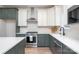 Well-equipped kitchen with stainless steel appliances, two-tone cabinets, and a center island at 18019 Wilbanks Dr, Charlotte, NC 28278