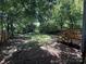 Large backyard with wooden steps at 2017 Ashley Rd, Charlotte, NC 28208