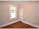 Bedroom with hardwood floors and natural light at 2017 Ashley Rd, Charlotte, NC 28208