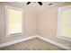 Cozy bedroom with vinyl floors and natural lighting at 2017 Ashley Rd, Charlotte, NC 28208