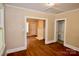 Cozy living room featuring hardwood floors and a decorative fireplace at 2017 Ashley Rd, Charlotte, NC 28208