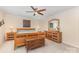 This bright bedroom features neutral walls, carpet and a light colored wood furniture set, including a unique blanket chest at 2037 Christopher Wood Ct, Fort Mill, SC 29707
