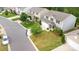 Well-manicured front yard with lush green grass, mature trees, and inviting curb appeal at 2037 Christopher Wood Ct, Fort Mill, SC 29707