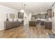 Spacious kitchen featuring wood floors, ample counterspace and dark cabinets at 2037 Christopher Wood Ct, Fort Mill, SC 29707