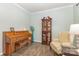 Inviting living room with hardwood floors, a decorative hutch, and a comfortable armchair, creating a warm atmosphere at 2037 Christopher Wood Ct, Fort Mill, SC 29707