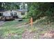 Single-story house features a charming front porch, creating a welcoming and cozy atmosphere at 226 Lake Sylvia Rd, Lincolnton, NC 28092
