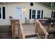 Cozy front porch with seating, offering a welcoming entrance to this home at 226 Lake Sylvia Rd, Lincolnton, NC 28092