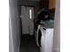 Laundry room with washing machine, dryer, and tile flooring at 226 Lake Sylvia Rd, Lincolnton, NC 28092