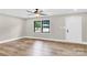 Bright bedroom with wood-look flooring and double windows at 2323 Brookwood Rd, Lincolnton, NC 28092