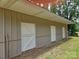 Metal barn with three stall doors and tan siding, on a green lot at 2905 Medlin Rd # 40 Acres, Monroe, NC 28112
