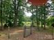 Gated entry into a wooded property at 2905 Medlin Rd # 40 Acres, Monroe, NC 28112